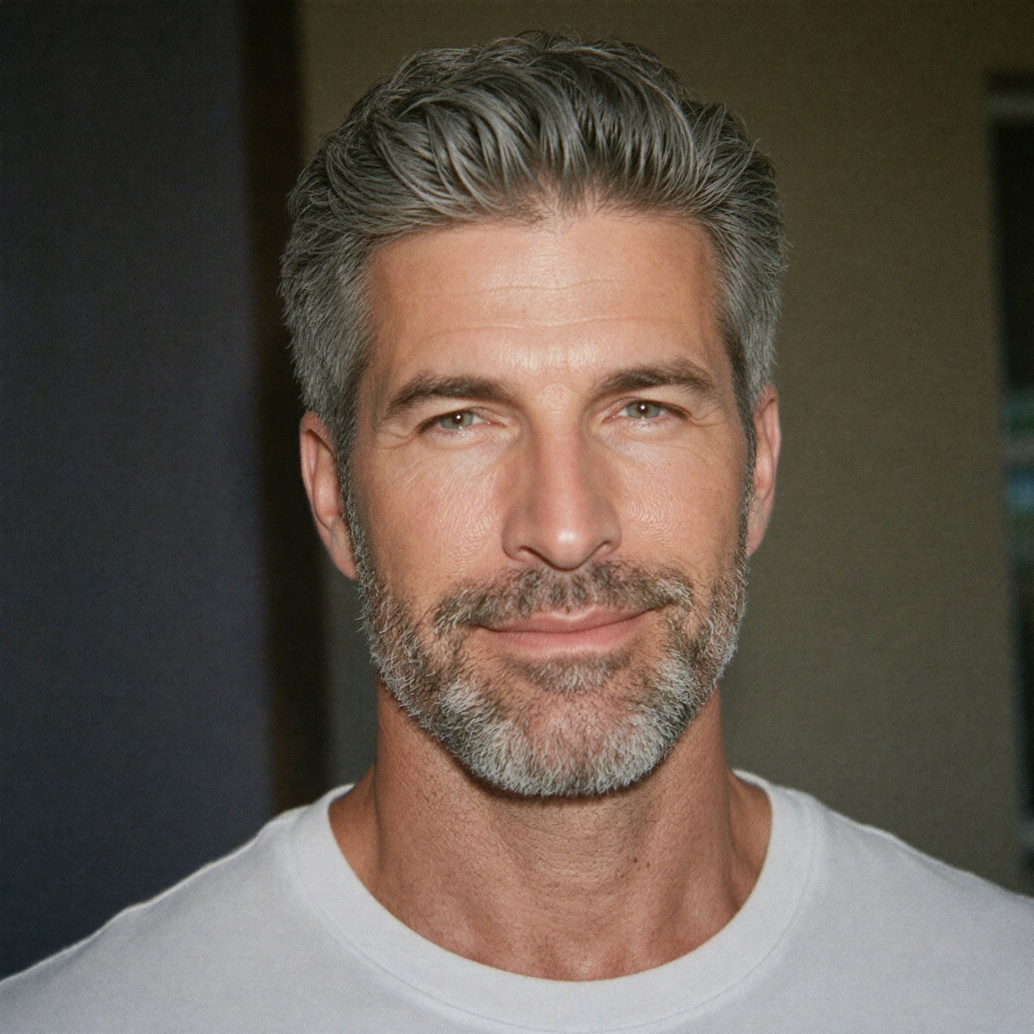 Luke Ryan smiling softly at the camera